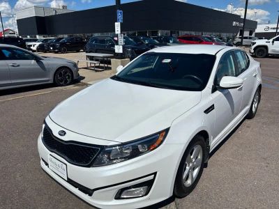 2015 Kia Optima LX in Snow White Pearl — front three-quarter view