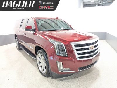 2020 Cadillac Escalade ESV Luxury in Red Passion Tintcoat — front three-quarter view