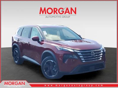 2026 Nissan Rogue SV in Red — front three-quarter view
