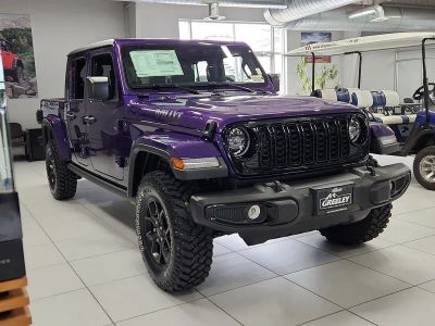 2026 Jeep Gladiator GLADIATOR WILLYS 4X4 in Reign Exterior Paint — front three-quarter view