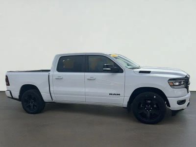 2021 RAM 1500 Big Horn Crew Cab 4x4 5'7' Box in Bright White Clearcoat — front three-quarter view