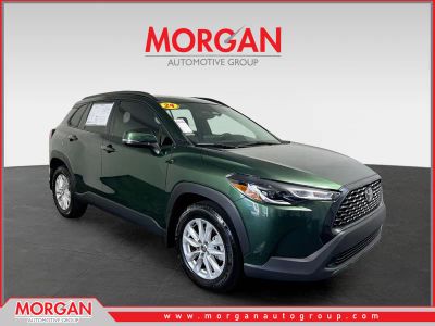 2024 Toyota Corolla Cross LE in Cypress — front three-quarter view