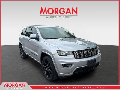 2017 Jeep Grand Cherokee Altitude in Billet Silver Metallic Clearcoat — front three-quarter view