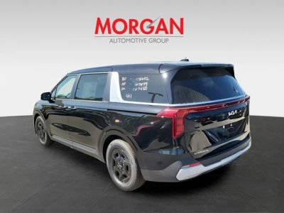 2026 Kia Carnival — rear three-quarter view
