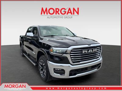 2026 Ram 1500 Laramie in Diamond Black Crystal Pearlcoat — front three-quarter view