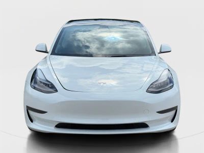 2023 Tesla Model 3 — side profile view