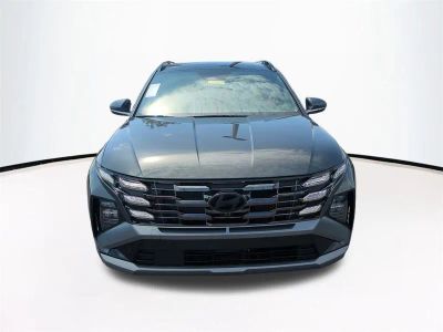 2026 Hyundai TUCSON HYBRID — rear three-quarter view