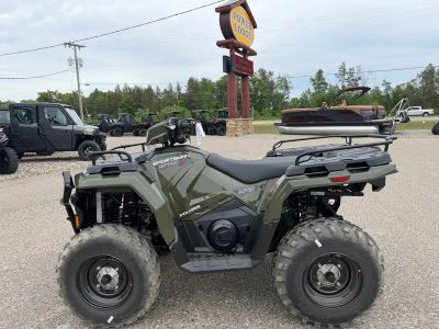2026 Polaris Sportsman 570 EPS A26SEE57A1 in Sage Green — front three-quarter view