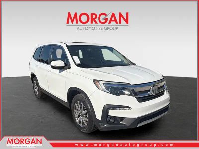 2021 Honda Pilot EX-L in White — front three-quarter view