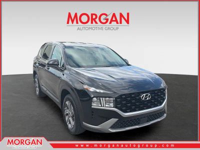 2023 Hyundai Santa Fe SE in Twilight Black — front three-quarter view