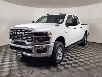 2025 RAM 2500 RAM 2500 TRADESMAN CREW CAB 4X4 6'4' BOX in Bright White Clear-Coat Exterior Paint — front three-quarter view