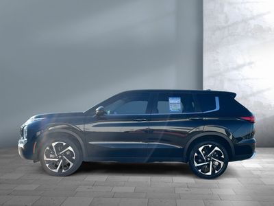2024 Mitsubishi Outlander — rear three-quarter view