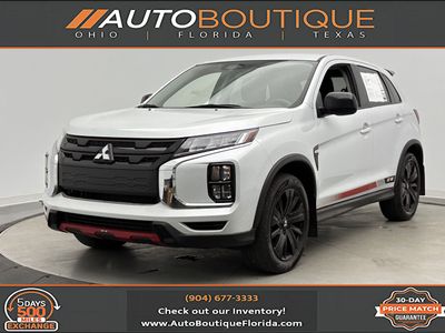 2023 Mitsubishi Outlander Sport LE in White — front three-quarter view