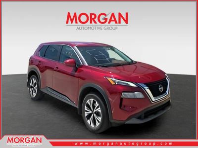 2023 Nissan Rogue SV in Red — front three-quarter view