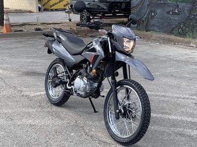 2025 Honda XR150L in GRAY — front three-quarter view