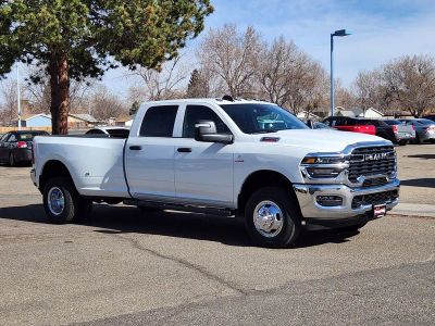 2026 RAM 3500 RAM 3500 TRADESMAN CREW CAB 4X4 8' BOX in Bright White Clear-Coat Exterior Paint — front three-quarter view