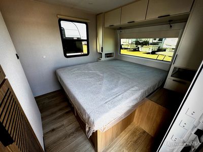 2026 Winnebago Thrive — rear three-quarter view