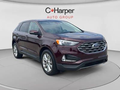 2024 Ford Edge Titanium in Burgundy — front three-quarter view
