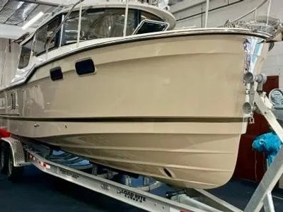 2026 Ranger Tugs R-27 — front three-quarter view