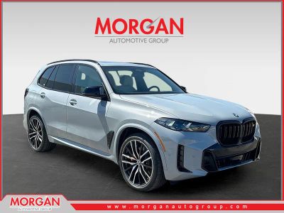 2026 BMW X5 M60i in Brooklyn Grey Metallic — front three-quarter view