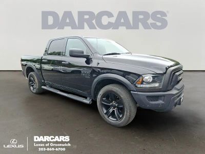 2022 RAM 1500 Classic Warlock in Diamond Black Crystal Pearlcoat — front three-quarter view