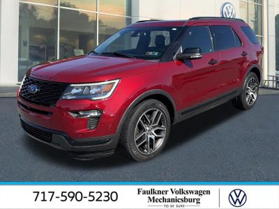 2018 Ford Explorer Sport 4WD in Ruby Red Metallic Tinted Clearcoat — front three-quarter view
