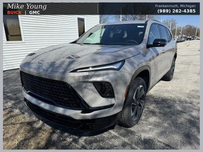2026 Buick Enclave Sport Touring in Stone Metallic — front three-quarter view