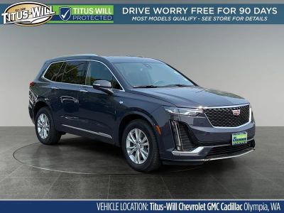 2025 Cadillac XT6 Luxury in Midnight Sky Metallic — front three-quarter view