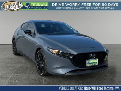 2024 Mazda Mazda3 2.5 S Carbon Edition in Gray Metallic — front three-quarter view