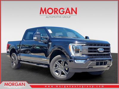 2023 Ford F-150 Lariat in Black — front three-quarter view