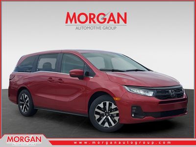 2026 Honda Odyssey EX-L in Radiant Red Metallic II — front three-quarter view