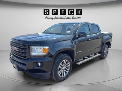 2016 GMC Canyon 4WD SLE in Onyx Black — front three-quarter view