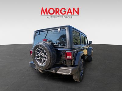 2026 Jeep Wrangler — rear three-quarter view