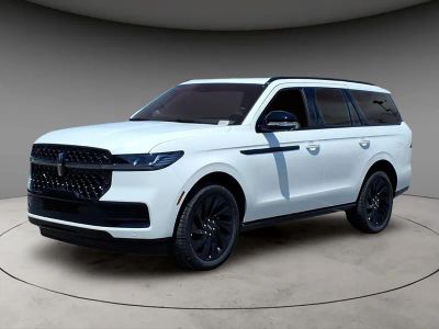 2026 Lincoln Navigator Reserve in White Metallic — front three-quarter view