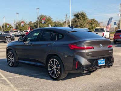 2022 BMW X4 — rear three-quarter view
