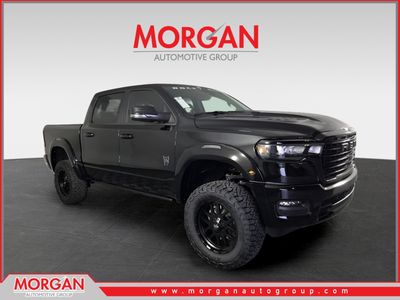 2026 Ram 1500 Laramie in Black — front three-quarter view