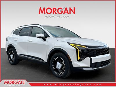 2026 Kia Sportage Hybrid EX in Snow White Pearl — front three-quarter view