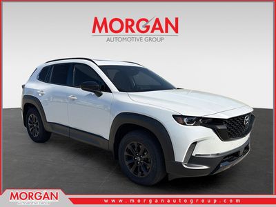 2026 Mazda CX-50 Hybrid Premium in Wind Chill Pearl — front three-quarter view