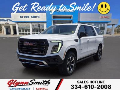 2026 GMC Yukon AT4 Ultimate in Summit White — front three-quarter view