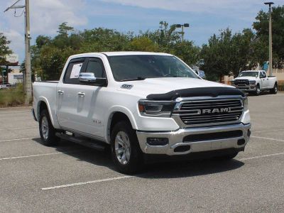 2022 RAM 1500 Laramie in Bright White Clearcoat — front three-quarter view