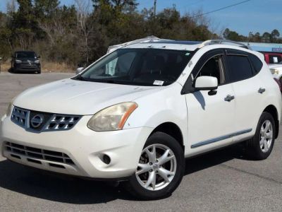 2011 Nissan Rogue SV in White — front three-quarter view