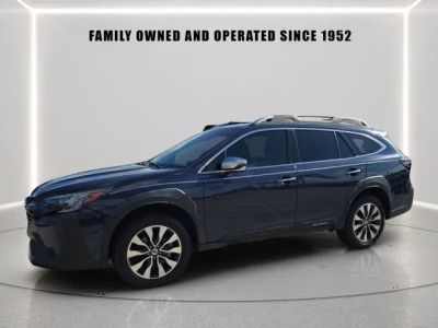 2023 Subaru Outback Touring XT in Cosmic Blue Pearl — front three-quarter view