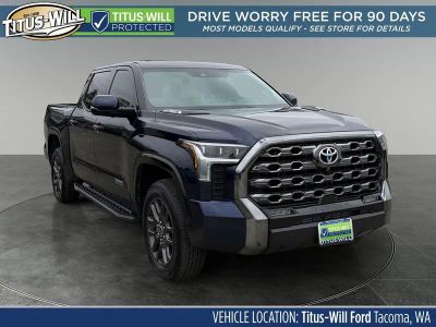 2022 Toyota Tundra Hybrid Platinum in Blueprint — front three-quarter view
