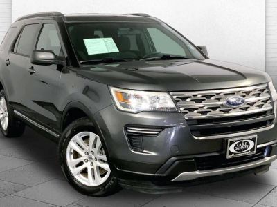 2018 Ford Explorer XLT in Magnetic — front three-quarter view