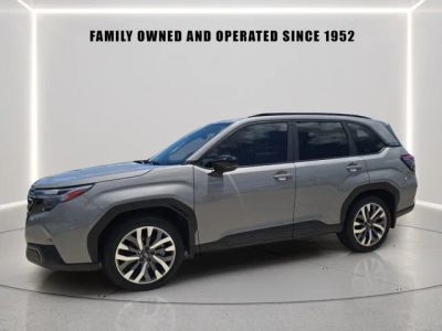 2025 Subaru Forester Touring in River Rock Pearl — front three-quarter view