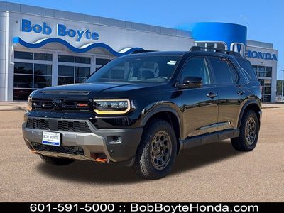 2026 Honda Passport TrailSport Blackout in Crystal Black Pearl — front three-quarter view