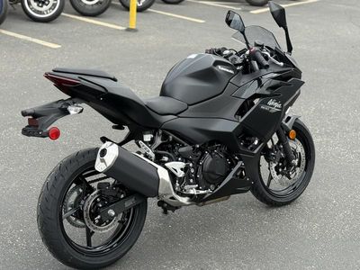 2026 Kawasaki Ninja 500 Metallic Flat Spark Black — rear three-quarter view