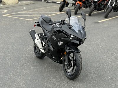 2026 Kawasaki Ninja 500 Metallic Flat Spark Black in METALLIC FLAT SPARK BLACK/METALLIC SPARK BLACK — front three-quarter view