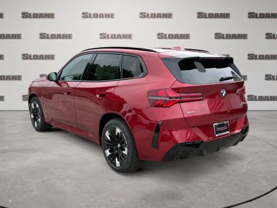 2026 BMW X3 — rear three-quarter view