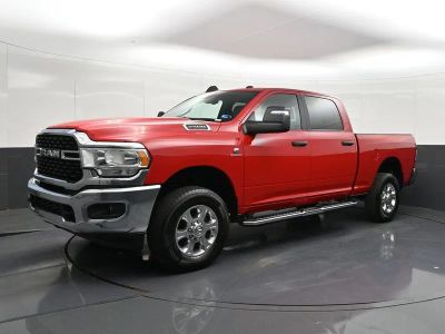 2023 RAM 2500 Big Horn in Flame Red Clearco — front three-quarter view